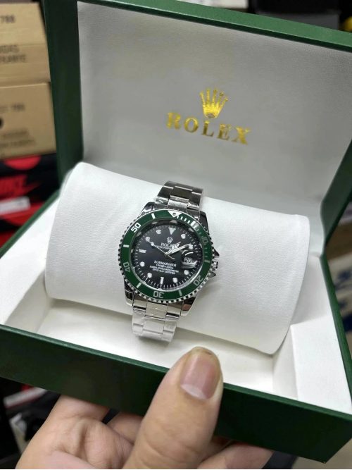 Rolex Submariner Date Iconic Luxury Watch Green and Silver