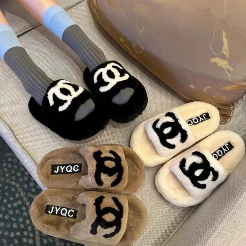 Chanel Furry Logo Slippers Cozy Plush Shoes Black Beige and White