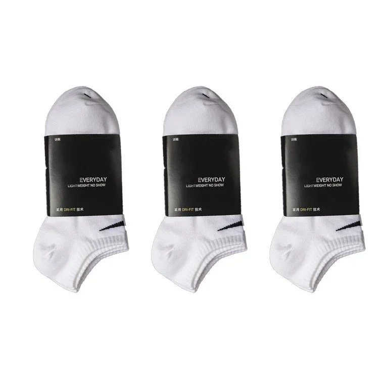 three pairs of white short three pairs of white short